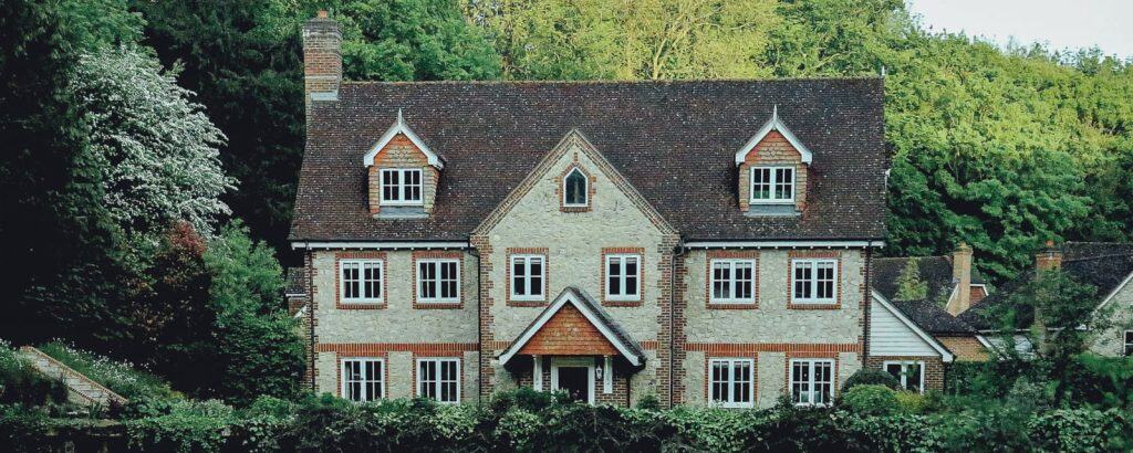 Picturesque historic house nestled among lush green trees in Tampa.